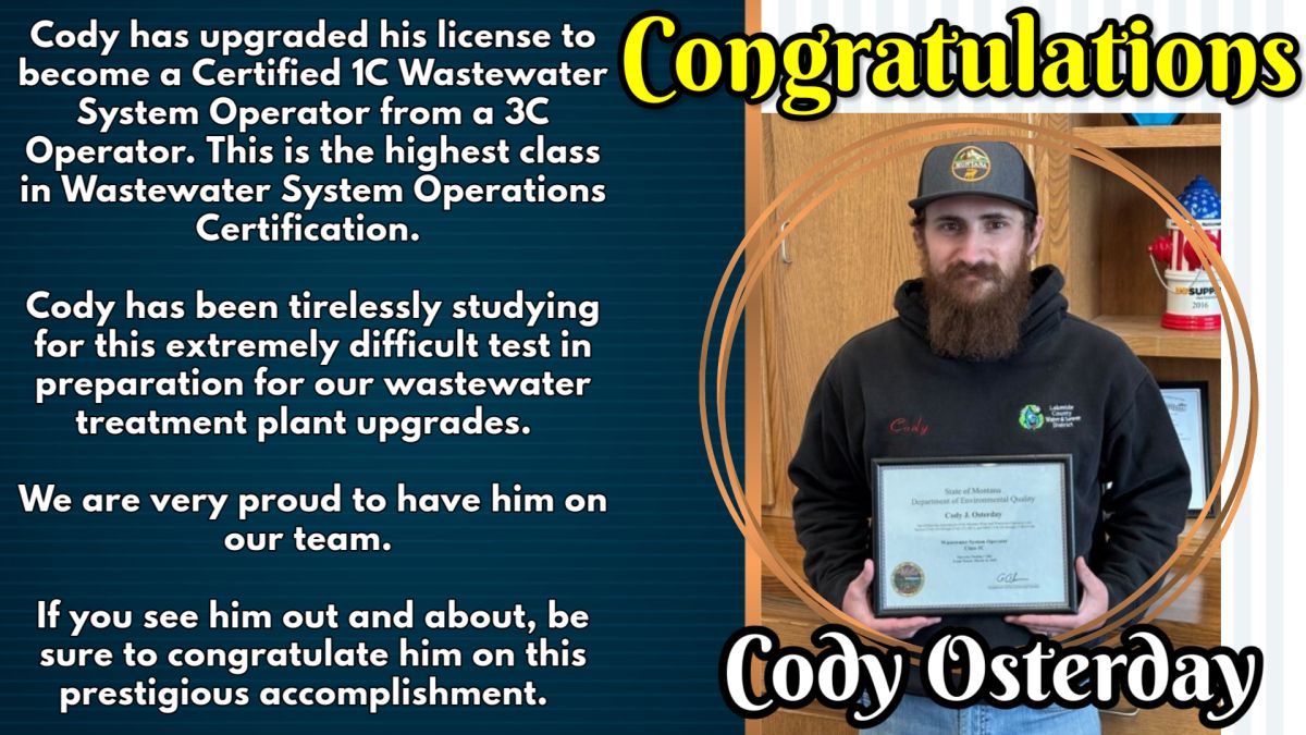 Proud man standing with award